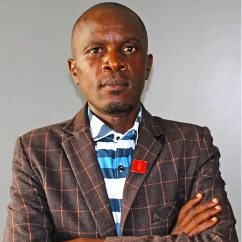 Amb. Kim Walusimbi